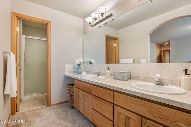 19 N 86th Ave, Yakima, WA 98908 - full bath featuring double vanity, tasteful backsplash, a stall shower, and a sink