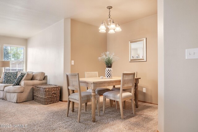 19 N 86th Ave, Yakima, WA 98908 - dining area featuring light carpet, baseboards, visible vents, and a chandelier