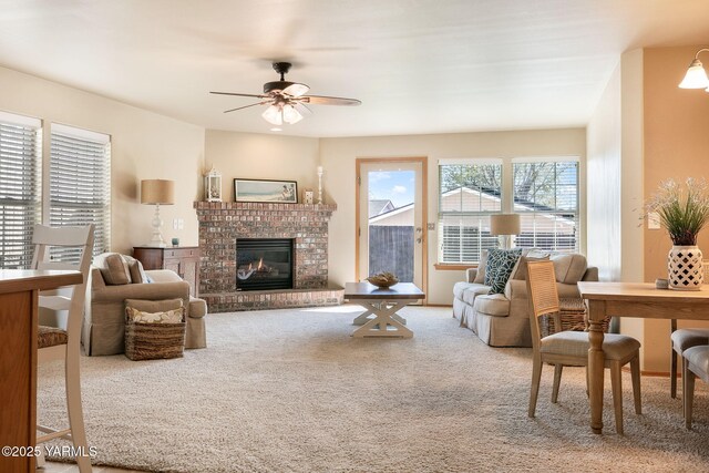 19 N 86th Ave, Yakima, WA 98908 - living room featuring a ceiling fan, a brick fireplace, and carpet floors