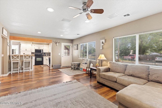 8301 Aspen Rd, Yakima, WA 98903 - living room featuring a ceiling fan, wood finished floors, and recessed lighting
