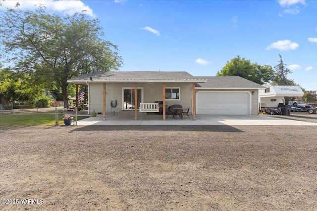 8301 Aspen Rd, Yakima, WA 98903 - ranch-style house with an attached garage, concrete driveway, and a porch
