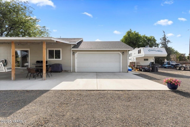 8301 Aspen Rd, Yakima, WA 98903 - view of front of house featuring driveway and a garage