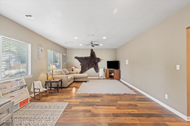 8301 Aspen Rd, Yakima, WA 98903 - living room with wood finished floors, a ceiling fan, and recessed lighting