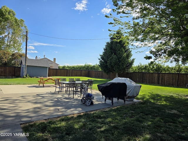 175001 W King Tull Rd, Grandview, WA 98930 - view of patio / terrace featuring a grill and an outdoor structure