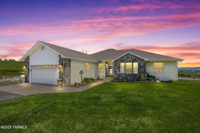 190 Shadbolt Rd, Yakima, WA 98908 - ranch-style house featuring stone siding, a yard, a garage, and driveway