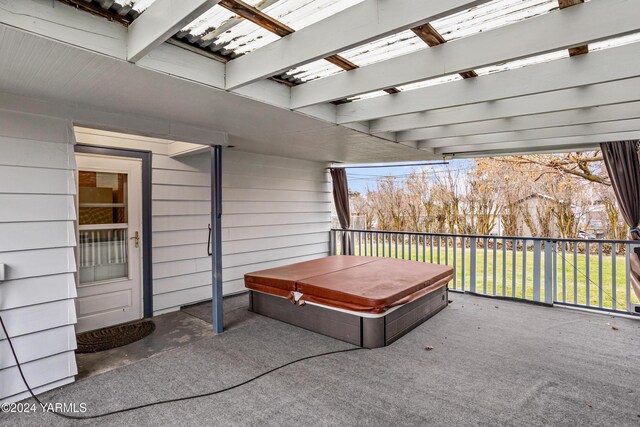 view of patio with a covered hot tub