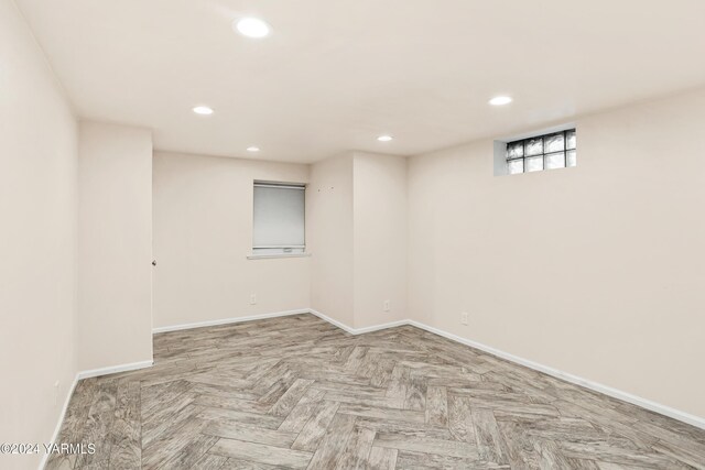 basement featuring recessed lighting and baseboards