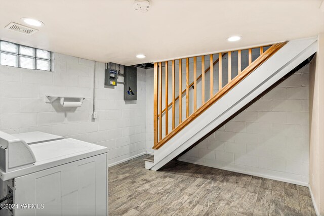 laundry area with recessed lighting, laundry area, visible vents, and wood finished floors