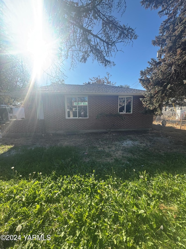 view of front of property with brick siding