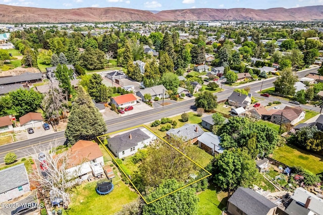 3212 W Lincoln Ave, Yakima, WA 98902 - aerial perspective of suburban area featuring property boundaries highlighted and mountains