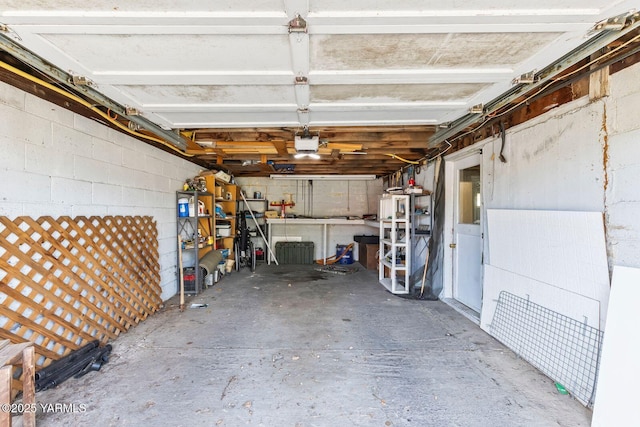 3212 W Lincoln Ave, Yakima, WA 98902 - garage with concrete block wall and a garage door opener