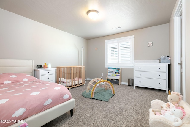 7902 W Whatcom Ave, Yakima, WA 98903 - bedroom featuring carpet floors, baseboards, and visible vents