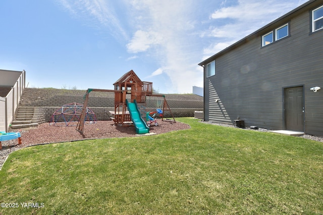 7902 W Whatcom Ave, Yakima, WA 98903 - view of playground with a yard and fence