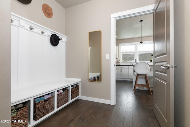 7902 W Whatcom Ave, Yakima, WA 98903 - mudroom with baseboards and dark wood-style floors
