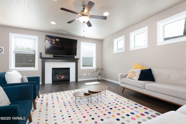 7902 W Whatcom Ave, Yakima, WA 98903 - living area with recessed lighting, ceiling fan, a glass covered fireplace, and wood finished floors