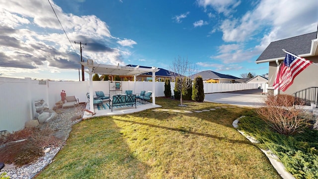 view of yard featuring a patio area and a fenced backyard