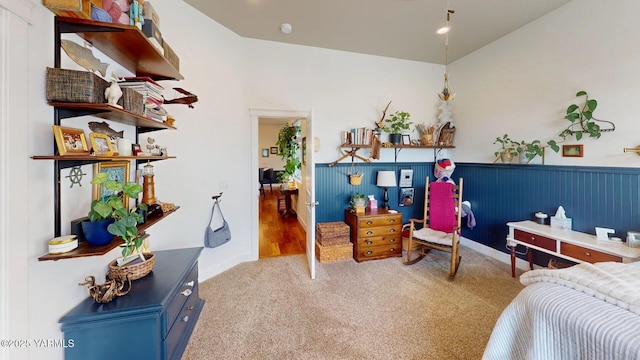 carpeted bedroom with wainscoting