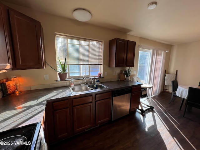 1215 Vineyard Dr, Tieton, WA 98947 - kitchen featuring dishwasher, stove, plenty of natural light, and dark wood finished floors