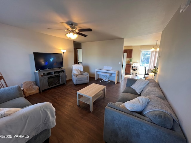 1215 Vineyard Dr, Tieton, WA 98947 - living room featuring dark wood finished floors, ceiling fan, and a chandelier