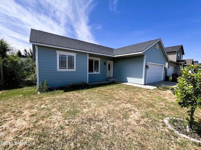 1215 Vineyard Dr, Tieton, WA 98947 - single story home with an attached garage and a front yard