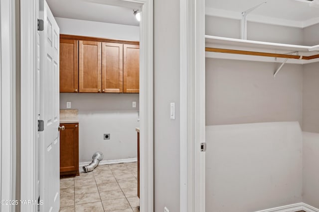 1008 S 91st Ave, Yakima, WA 98908 - laundry area with hookup for an electric dryer and cabinet space