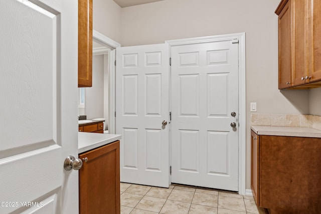 1008 S 91st Ave, Yakima, WA 98908 - laundry area with light tile patterned flooring