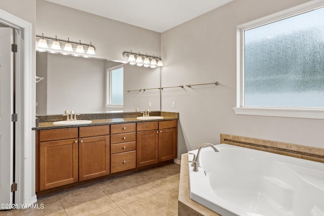 1008 S 91st Ave, Yakima, WA 98908 - bathroom with double vanity, a bath, and tile patterned flooring