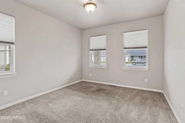 1008 S 91st Ave, Yakima, WA 98908 - empty room featuring carpet and baseboards