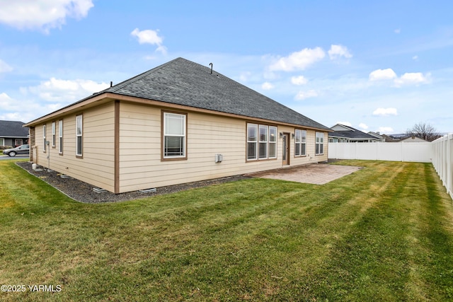 1008 S 91st Ave, Yakima, WA 98908 - back of house with a patio area and roof with shingles