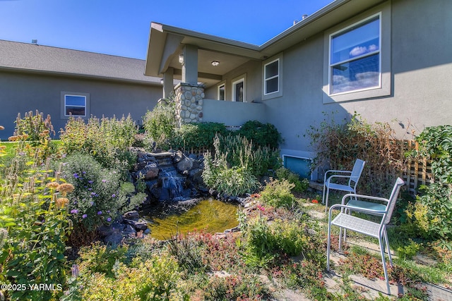 exterior space with stucco siding