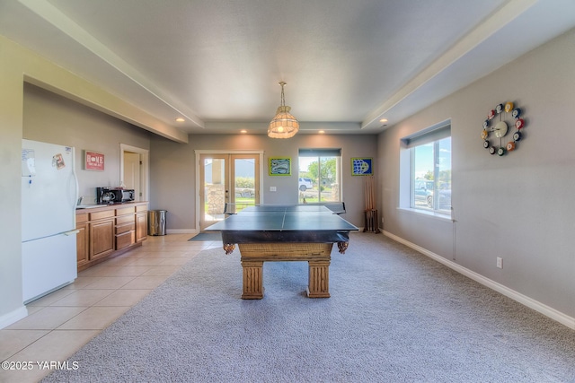 game room with light tile patterned floors, baseboards, a raised ceiling, french doors, and recessed lighting