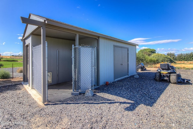 view of outbuilding featuring an outdoor structure