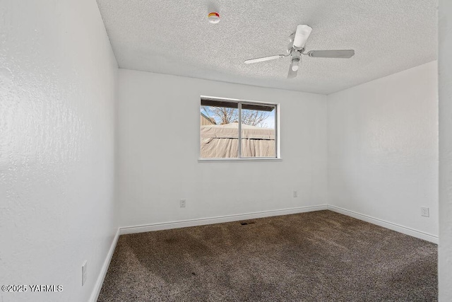 spare room featuring carpet, ceiling fan, a textured ceiling, and baseboards