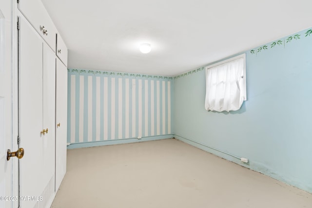 empty room featuring finished concrete floors