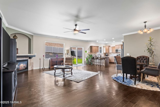 1504 W Naches Ave, Selah, WA 98942 - living area featuring ornamental molding, a ceiling fan, a fireplace, recessed lighting, and dark wood finished floors