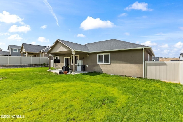 1504 W Naches Ave, Selah, WA 98942 - rear view of property with stucco siding, a patio, and a shingled roof