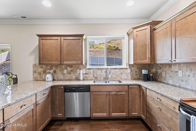 1504 W Naches Ave, Selah, WA 98942 - kitchen with appliances with stainless steel finishes, dark wood-type flooring, tasteful backsplash, light stone counters, and crown molding