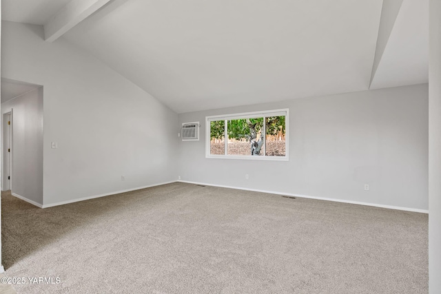 202 N 80th Ave, Yakima, WA 98908 - carpeted spare room with a wall unit AC, lofted ceiling with beams, baseboards, and visible vents