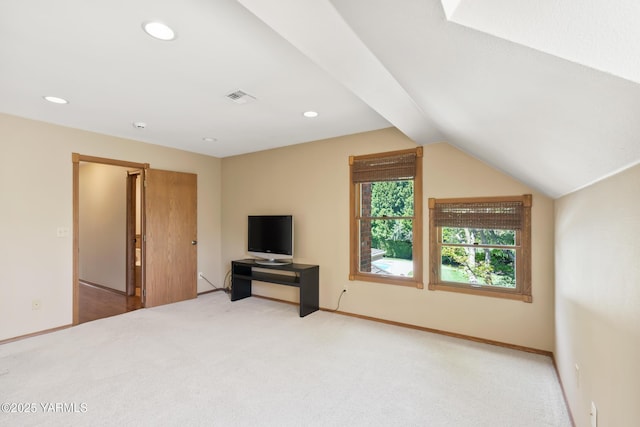 unfurnished living room featuring recessed lighting, visible vents, carpet flooring, and vaulted ceiling