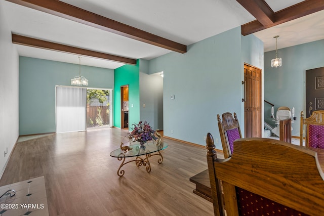24 Crest Cir, Yakima, WA 98908 - dining room with a chandelier, beamed ceiling, and wood finished floors