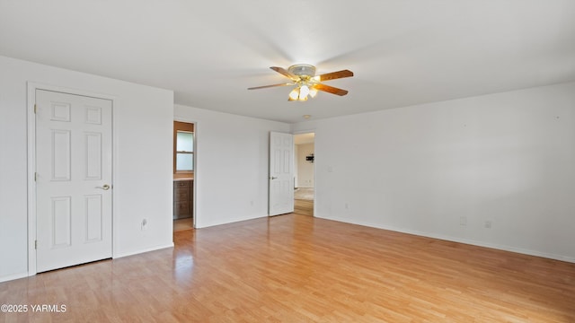 40 Vista Verde Dr, Yakima, WA 98901 - unfurnished bedroom with light wood-style flooring, baseboards, and ensuite bathroom