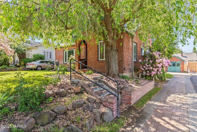 view of front of home with brick siding