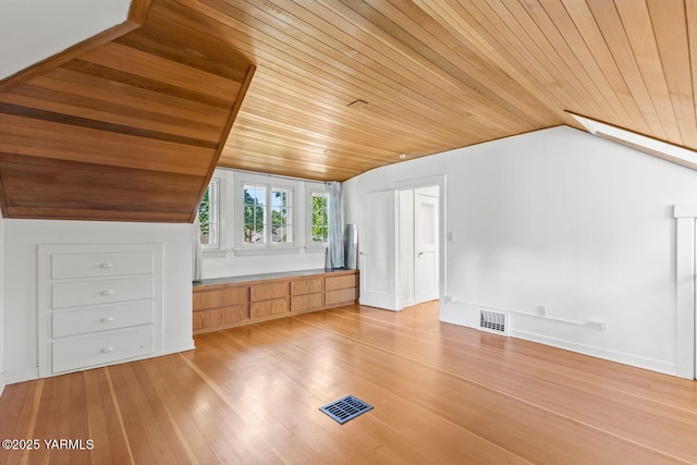bonus room with wood ceiling, visible vents, lofted ceiling, and light wood-type flooring
