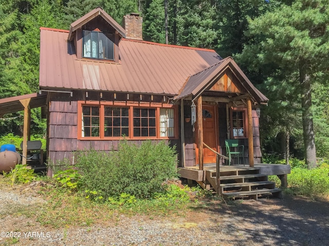 30711 Hwy 410, Naches, WA 98937 - view of front of property featuring a chimney and a metal roof