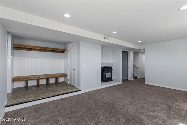101 Hickory Ln, Selah, WA 98942 - finished basement with recessed lighting, carpet floors, stairway, and a wood stove