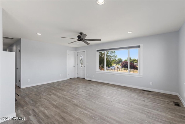 101 Hickory Ln, Selah, WA 98942 - unfurnished living room featuring ceiling fan, wood finished floors, and recessed lighting