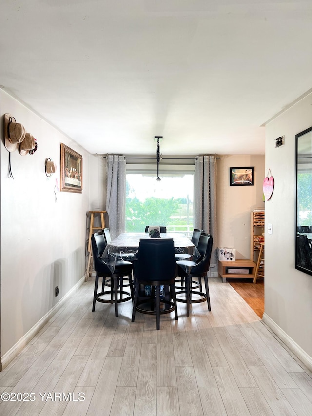 1341 Cemetery Rd, Sunnyside, WA 98944 - dining area with light wood-type flooring and baseboards