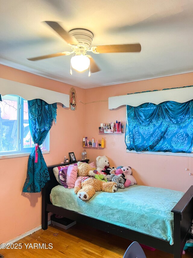 1341 Cemetery Rd, Sunnyside, WA 98944 - bedroom featuring wood finished floors, ceiling fan, and baseboards