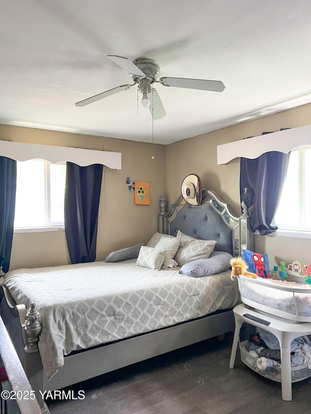 1341 Cemetery Rd, Sunnyside, WA 98944 - bedroom featuring multiple windows, wood finished floors, and a ceiling fan
