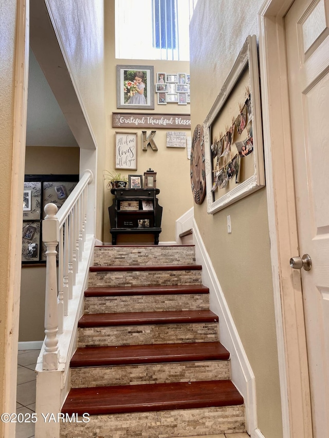 106 S G St, Toppenish, WA 98948 - stairway featuring tile patterned flooring and a high ceiling